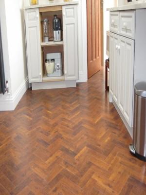 Carpetstyle Northwood Hills and Watford supplied and installed amtico signature priory oak herringbone laying pattern in Gerrads Cross