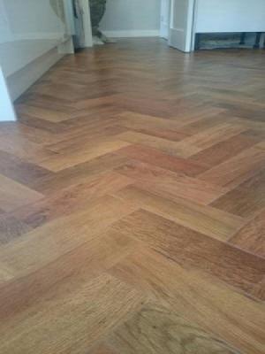 art select auburn oak herringbone parquet lvt laid by approved installers and a silver retailer