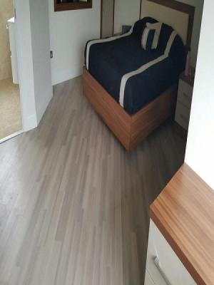 Amtico spacia mirrus cotton laid on the 45° with a one plank border. supplied and installed in northwood hills using apporved amtico fitters 